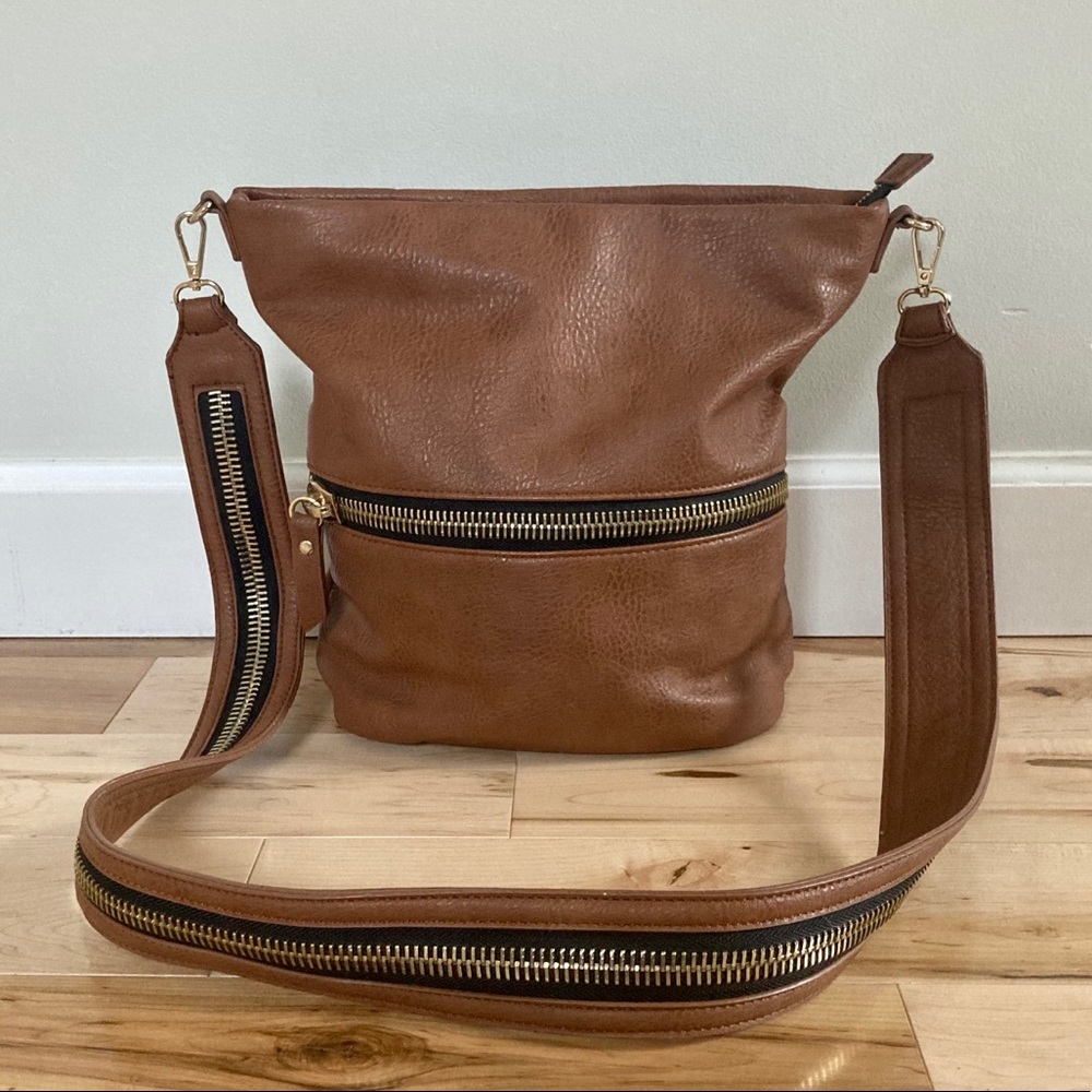 Madison West brown bucket purse zipper detail